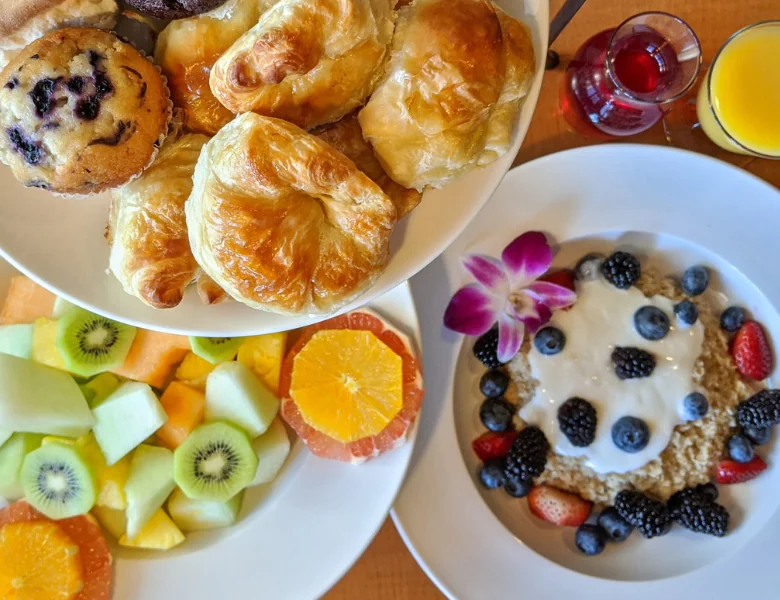 Pastries and various fruits for breakfast